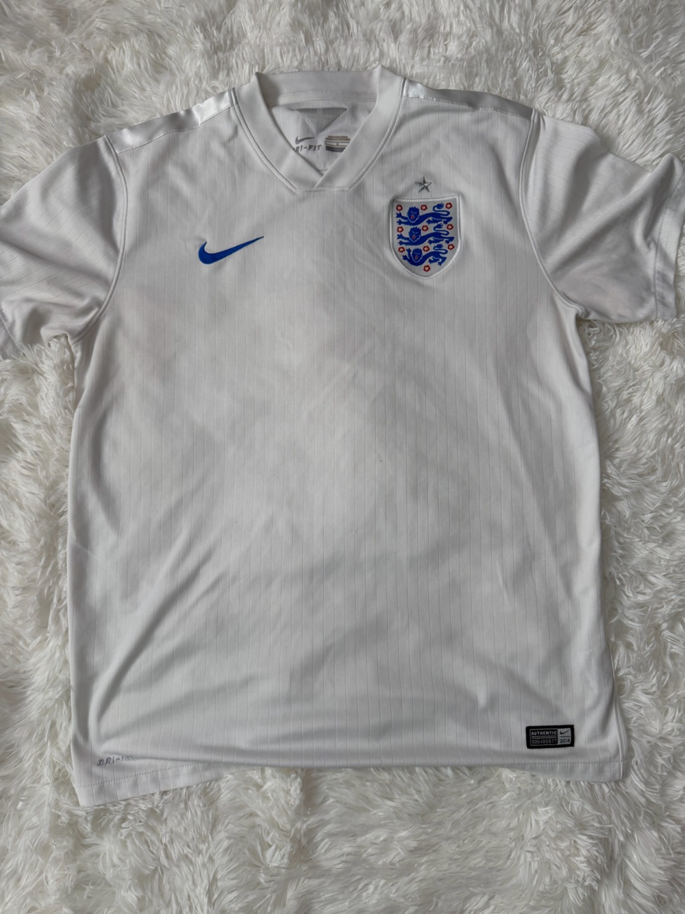 Nike White Men’s England Football Jersey with Blue Accents